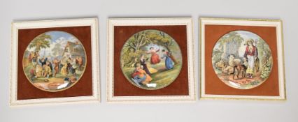 THREE PRATT WARE POT LIDS WITH SOCIAL VIGNETTES, all framed and comprising the titled 'THE VILLAGE