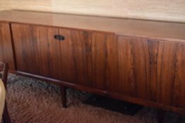 DANISH ROSEWOOD SIDEBOARD four sliding doors on six tapered supports, 240cms wide, Rosengren Hansen