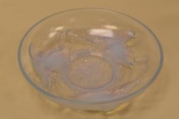 AN EZAN OPALASCENT DISH with dove decoration, 25cms diam