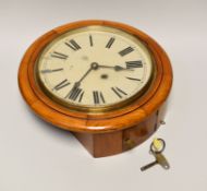 A VINTAGE SCHOOL ROOM TYPE WALL CLOCK in light oak circular encasing with enamel dial bearing