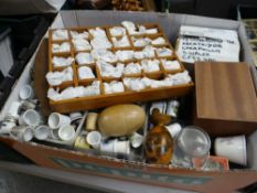 A large quantity of porcelain thimbles etc