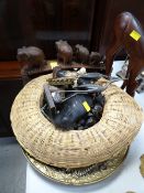 A parcel of souvenir carvings, brass dish etc