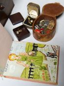 A vintage autograph book and contents - mainly friendship mementos - and a leather stud box and