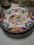 Three Derby pottery plates and a similar dish, a child's teaset