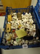 A large quantity of souvenir and other novelty porcelain thimbles