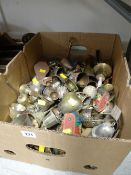 A box of brass bells etc