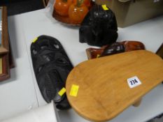 A small wooden stool and sundry native carvings