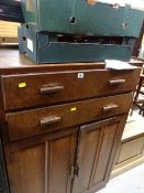 A polished tallboy and garage contents