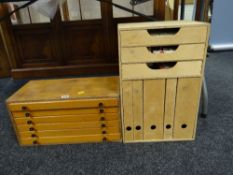 Six drawer wooden chest containing various thimbles together with a lightwood thimble
