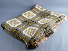 A MUSTARD COLOURED TRADITIONAL WELSH WOOLLEN BLANKET with 'Derw' label, 232 x 160 cms approximately