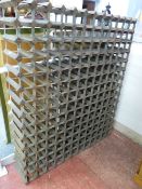 A VINTAGE ONE HUNDRED & EIGHTY BOTTLE FLOORSTANDING WINE RACK, 143 cms high, 122 cms wide, 25 cms