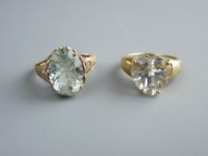 A NINE CARAT GOLD DRESS RING with large heart shaped cubic zircon and a nine carat gold dress ring