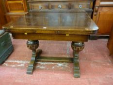 AN OAK DRAW LEAF DINING TABLE with substantial bulbous supports and cross stretcher, 76 cms high, 90