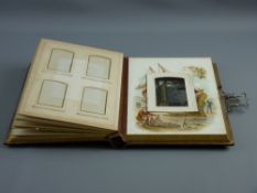 A SUPERBLY MAINTAINED EDWARDIAN MUSICAL PHOTO ALBUM, the front cover attractively decorated in