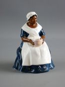 A ROYAL DOULTON POTTERY FIGURINE 'Royal Governor's Cook' HN2233
