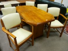 AN ART DECO WALNUT DINING TABLE & SIX (FOUR PLUS TWO) CHAIRS, the quarter veneered figured walnut