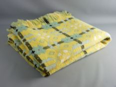 A TRADITIONAL WELSH WOOLLEN BLANKET in yellow and turquoise tones, 200 x 170 cms