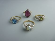 AN EIGHTEEN CARAT GOLD CROSSOVER DRESS RING with oval opal and tiny flanking diamonds and three