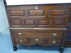 A GEORGE III OAK MULE CHEST, well coloured peg-joined construction with lidded top over a seven