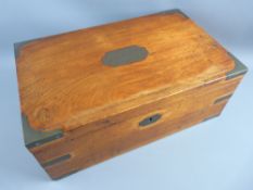 A VICTORIAN MAHOGANY & BRASS MOUNTED WRITING SLOPE, the brass top plate inscribed 'John Harvey,
