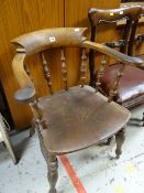 A vintage elm bent-wood elbow chair