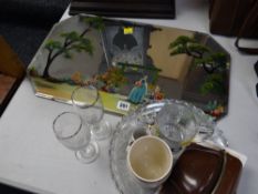 A vintage painted garden mirror together with glassware and a vintage Agfa camera