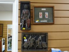 Two pottery relief design plaques, one of a standing Robert Bruce and the other of two mounted