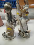 Two Lladro figurines - one with a litter of kittens the other with three cats chasing a broom