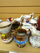 A quantity of mixed antique jugs including gaudy Welsh and copper lustre