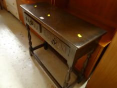 A two-drawer barley-twist side table