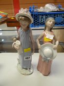 Two Lladro figurines of young girls, one with doll