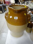 An excellent stoneware farmhouse dairy jug with twin-handles and in two-tone glaze