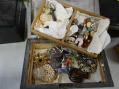 A pewter jewellery box and contents including yellow metal wedding band etc