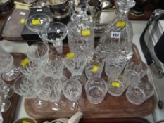 A large quantity of mixed glassware including two decanters