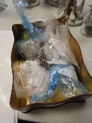 Quantity of loose coinage categorised into bags contained within a toffee tin