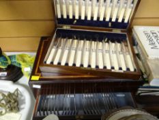 A good early twentieth century canteen of cutlery in an inlaid mahogany box with presentation
