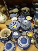 A large quantity of mixed blue Wedgwood Jasperware table items