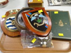 A parcel of military items including Special Boat Service shield, a volume of the Royal Marines