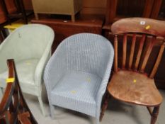 A vintage elm wood chair and a pair of loom chairs