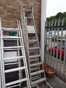 A tall set of Texas aluminium stepladders and a triple run set of longer ladders