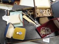Box containing costume jewellery, hallmarked silver fork, spoon and knife, thimble, white metal jew
