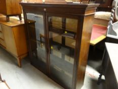 An antique two-door glazed bookcase cupboard top (no base) with internal shelves