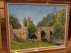 J A Norris oil on board - stone bridge over river with trees, entitled verso 'Cromford Bridge',