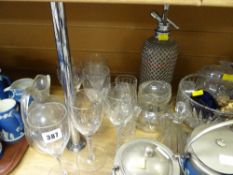 A parcel of mixed glassware and two ornamental gilded cherubs