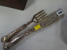 A pair of hallmarked silver fish servers with blade and handle in silver
