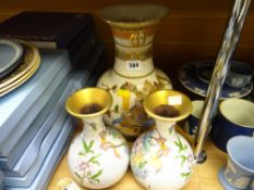 A pair of twentieth century cloisonne vases and an Oriental crackle glazed pottery vase