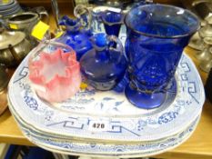 Sundry Staffordshire pottery platters and six items of coloured decorative glassware