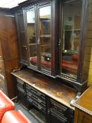 A stained oak semi-glazed dresser