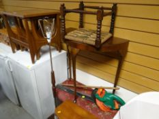 A G-plan or style nest of three coffee tables