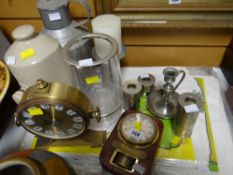 Brass effect mantel clock, stoneware hot water bottle, candlesticks etc